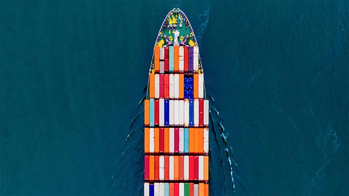 Top down image of shipping vessel on the ocean